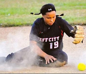 Lady Jays second baseman Maddie Washington knocks down a grounder during Tuesday's game with Troy at the American Legion Post 5 Sports Complex. <a href="/photos/">Stephen Brooks/News Tribune photo</a>.