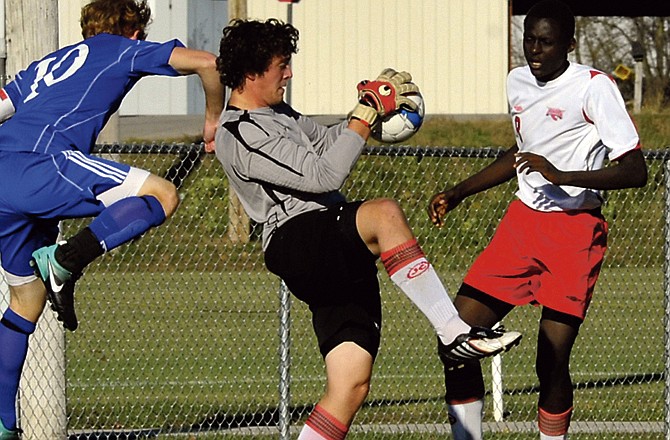 Jefferson City keeper C.J. Loehner makes a stop during Wednesday's game against Rockhurst at the 179 Soccer Park. The Jays will face Hickman in the Class 3 District 9 tournament this evening in Sedalia. 