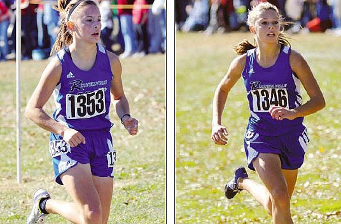 Russellville teammates Taylor Young (left) and Miranda Hill head toward the finish line Saturday in the Class 1 State Cross Country Championships at the Oak Hills Golf Center in Jefferson City. Russellville captured the team title. 
