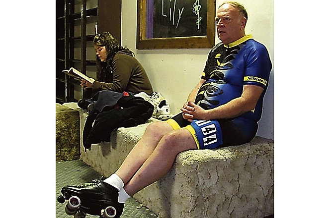 Frank Wallemann, Jefferson City, rests after completing a 10-lap race Sunday at the Roller Speed Skating League's monthly event, held at Sk8 Zone this month. At 72, Wallemann is the oldest competitor in the league.