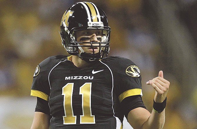 In this Sept. 4, 2010 file photo, Missouri quarterback Blaine Gabbert gestures during the second quarter of an NCAA college football game against the Illinois in St. Louis. It's been a tough couple of weeks for Gabbert. The Missouri quarterback says support from the coaching staff has not wavered.
