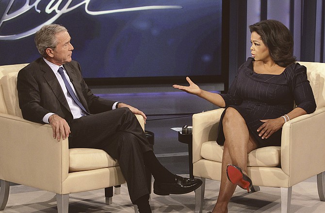 Talk-show host Oprah Winfrey interviews former President George W. Bush during taping of "The Oprah Winfrey Show" at Harpo Studios in Chicago. The show aired nationally on Tuesday.