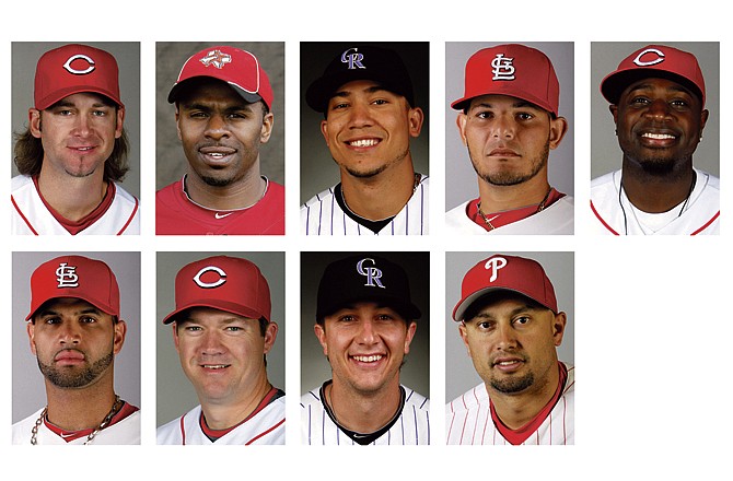 In this combo of 2010 file photos, the 2010 National League Gold Glove winners are shown. They are, top row from left, Cincinnati Reds pitcher Bronson Arroyo, Houston Astros outfielder Michael Bourn, Colorado Rockies outfielder Carlos Gonzalez, St. Louis Cardinals catcher Yadier Molina, and Reds second baseman Brandon Phillips; bottom row from left, Cardinals first baseman Albert Pujols, Reds third baseman Scott Rolen, Rockies shortstop Troy Tulowitzki, and Philadelphia Phillies outfielder Shane Victorino.