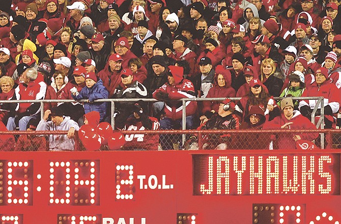 Nebraska fans look on during Saturday's game against Kansas at Memorial Stadium in Lincoln, Neb. Nebraska coach Bo Pelini said Tuesday he was making an observation, not ripping the fans, when he said he was disappointed with the "dead" atmosphere in the Kansas game. 