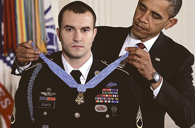 President Barack Obama presents the Medal of Honor on Tuesday to Staff Sgt. Salvatore Giunta, who rescued two members of his squad in October 2007 while fighting in the war in Afghanistan. 