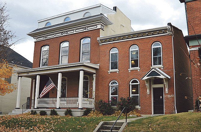 Dr. Robert Young lived in the home at 516 Capitol Ave., left, during an interesting period of Jefferson City's history. As a teenager, he served with Capt. M.M. Parson in the Confederate Army, then returned to Jefferson City after medical school. He was the author of a series of columns in the People's Tribune at the turn of the century. 