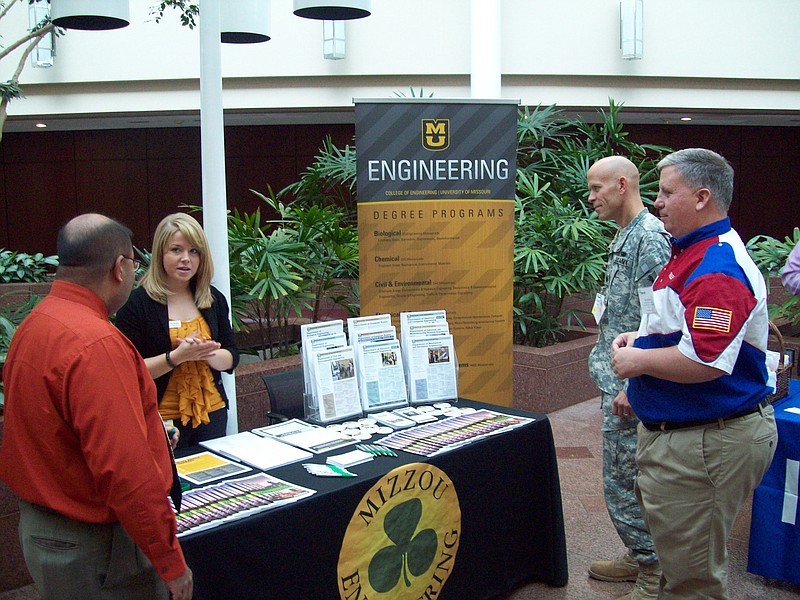 Shams Chughtai, left, state veterans coordinator with the Missouri Division of Workforce Development, discusses specialized degree programs with Tina Balser, recruitment coordinator with the University of Missouri's College of Engineering.