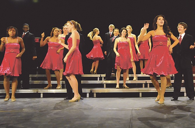 Jefferson City High School show choir JC Riot is shown rehearsing for Monday's show. With its new choreography, the choir took first place at the Webb City ShowChoir ShowCase last month.