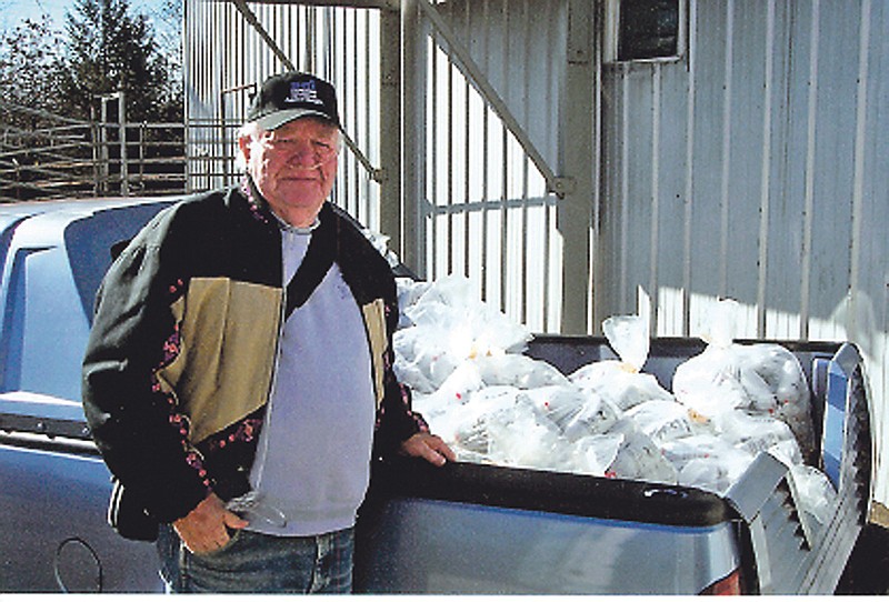 Contributed photo
Joel LeMaster of Fulton, a member of the Central Missouri Chapter of Safari Club International, Friday stands beside a pickup truck with a load of frozen processed venison that was donated by Callaway County deer hunters during the firearms hunting season that ended Tuesday in Missouri. LeMaster and Earl Cannon, another club member, plan to distribute more than 20,000 pounds of donated venison to area food banks and charities.