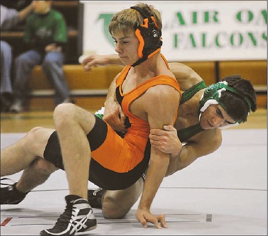 Blair Oaks' Kevin Adam (right) works on New Bloomfield's Tyler Spurgeon during Thursday's match at Wardsville.