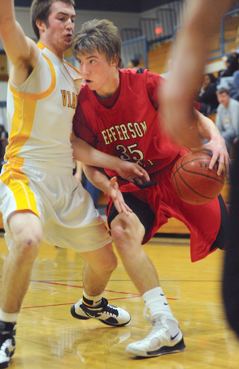 Paul McMahon, (35), drives toward the basket for  Jefferson City during the Central Bank Shootout Saturday afternoon, Jan. 16, 2010, at Rackers Fieldhouse. The Jays fell, 66-41, to the Vianney Golden Griffins.