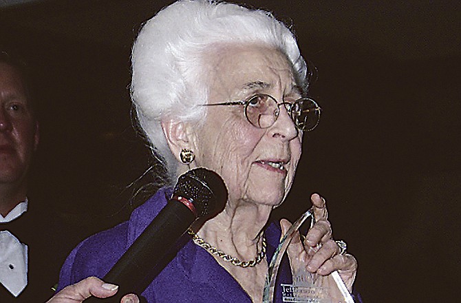 Historian and preservationist Elizabeth Rozier, seen above collecting a civic award in 2002, died Monday at age 103.