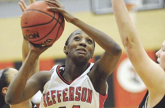 Nesha Wright of Jefferson City goes up for a basket during Saturday night's game against Webster Groves at Fleming Fieldhouse. 