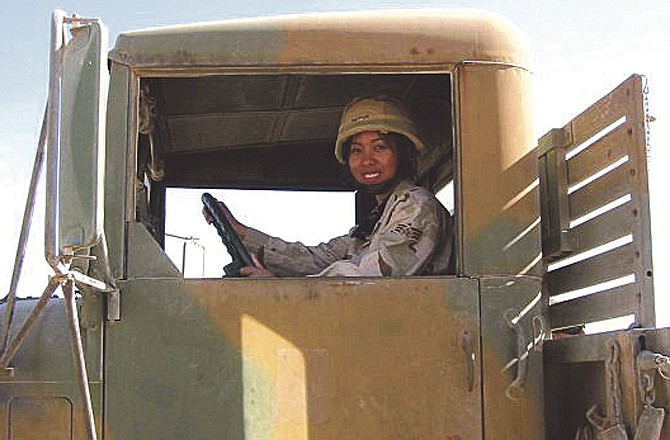 Air Force veteran Joy Pyles transported materials such as pipes for water lines to be used during the construction of water and sewer systems in Iraq. 