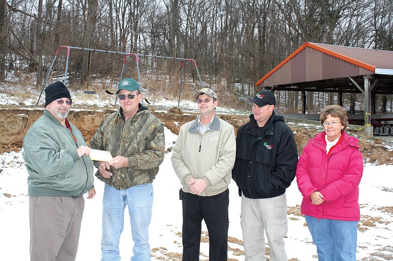 Mandi Steele/FULTON SUN photo: Representatives of Ameren Missouri presented a $1,000 check to Charles Schmid on Wednesday to help with the construction of a new Portland Community Center. From left, Steve Leroux, Schmid, Jeff Wallendorff, Chris Pfau and Phyllis Bohnert..