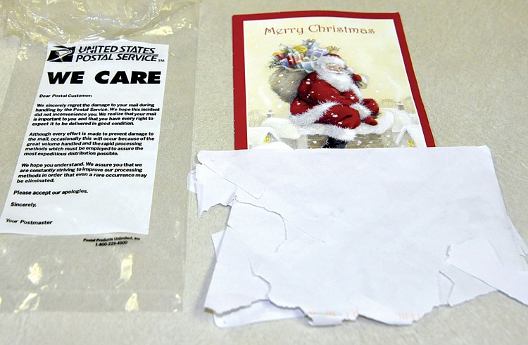 Despite all the care taken by the United States Postal Service during this busy season, some cheap envelopes and some recycled paper envelopes may get damaged during sorting. When buying Christmas cards, consumers should take care to purchase quality envelops.