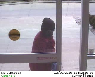 Image 1 of robbery suspect entering Credit Union.