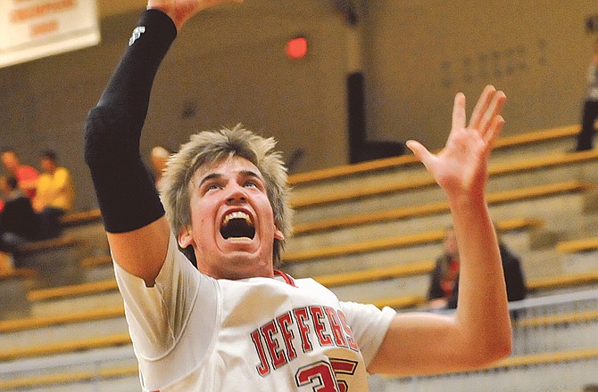 Paul McMahon of Jefferson City puts up a shot during Wednesday's game against Marquette at Fleming Fieldhouse.