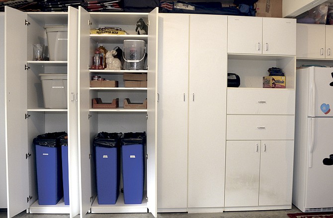 Garage space can easily be turned into usable space with the right cabinets for your things.
