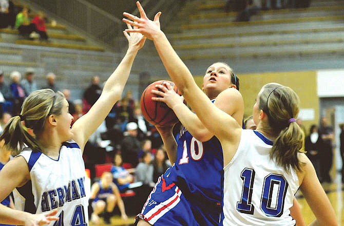 TyleRe Groans of California drives the lane to put up a shot during Monday's game against Hermann in the Missouri National Guard Shootout at Fleming Fieldhouse.