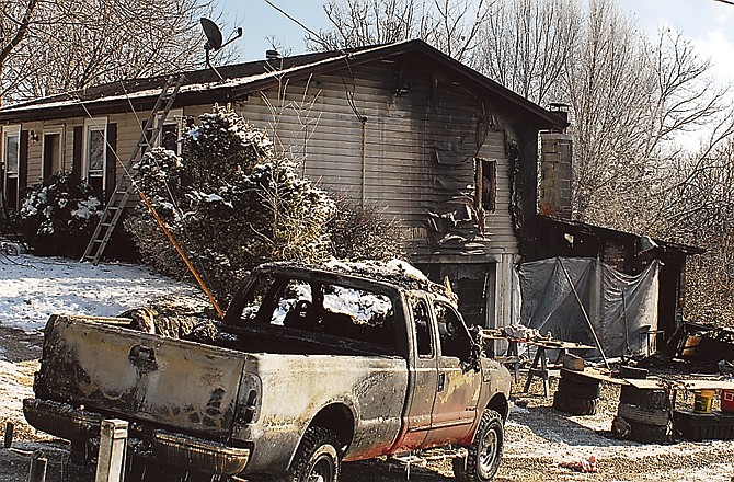 Heavy damage is evident following a weekend house fire on Rademan Lane in Cole County.