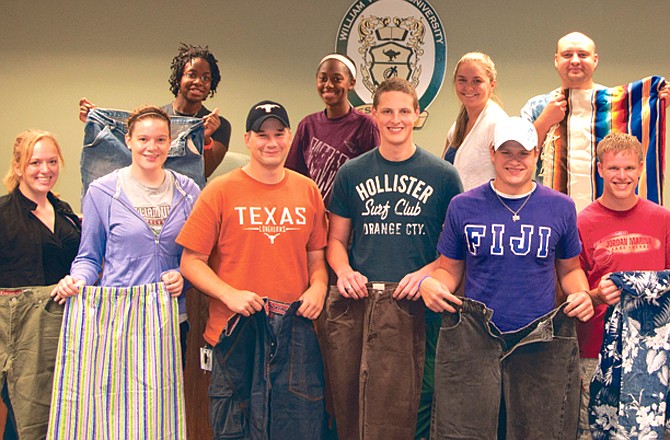 William Woods University's criminal justice fraternity provides jeans for offenders incarcerated in the Jefferson City Correctional Center to use for making quilts.Â Left to right, front row: Lacy Gevers, Kirsten Hipkins, Patrick Powers, Zach Brubaker, Shawn Claypool and Michael Stradford; back row: Tyler Parker, Key'onta Johnson, Kia Coddington and Cory Harlan.
