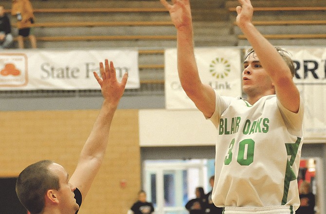 Ben Cooper of Blair Oaks goes up for a shot during Tuesday's game against Evangelical Christian at Fleming Fieldhouse. 