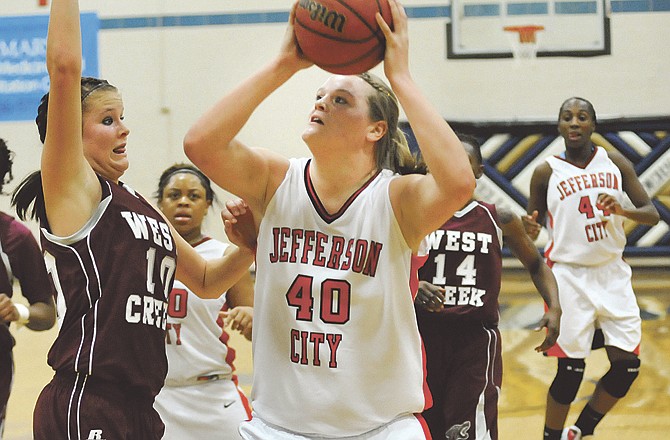 Shelby Mustain tossed in 20 points Tuesday night to lead Jefferson City in a 70-40 victory over West Creek. 