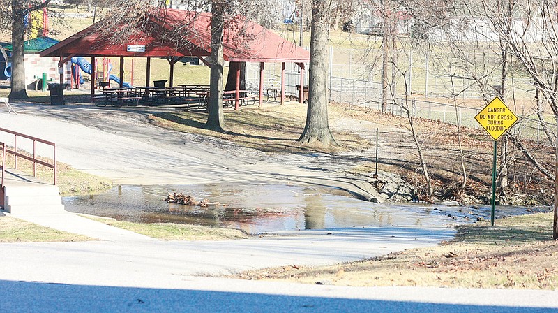 Water continues to flood areas of Fulton from heavy ran that fell Friday. The water over the roadway at Veteran's Park prompted officials to close the driveway to the pavilion and other areas. Flooding is also present around the new roundabout and Stinson Creek is higher than normal due to the heavy rains. The weather also prompted a tornado warning in the northern part of the county for a brief period on Friday.