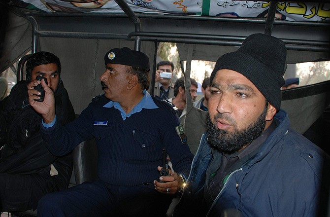 Mumtaz Qadri, right, a commando in Pakistan's elite force, allegedly killed the man he was charged with protecting, Punjab's governor, Salman Taseer, on Tuesday.