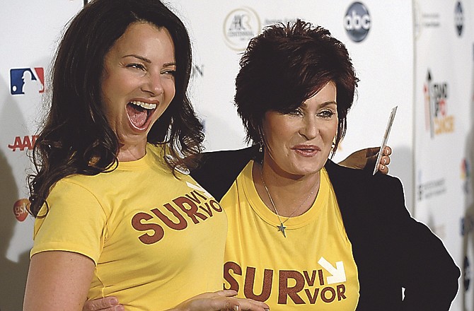 Fran Drescher, left, and Sharon Osbourne pose together at the Stand Up to Cancer benefit at the Kodak Theater in Los Angeles. Mass General, Sloan-Kettering, University of Texas M.D. Anderson Cancer Center in Houston and Dana-Farber Cancer Institute in Boston will start using a blood test so sensitive that it can spot a single cancer cell lurking among a billion healthy ones in 2011. They are one of the "dream teams" sharing a $15 million grant from the Stand Up to Cancer telethon, run by the American Association for Cancer Research. 