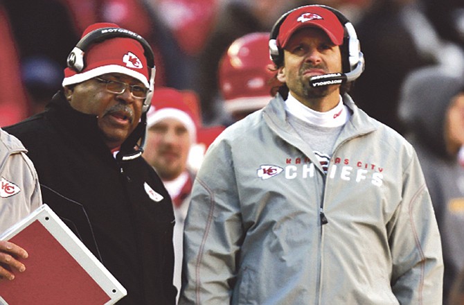 Chiefs defensive coordinator Romeo Crennel (left) and head coach Todd Haley watch the video screen during the third quarter of Sunday's loss to the Raiders at Arrowhead Stadium. 