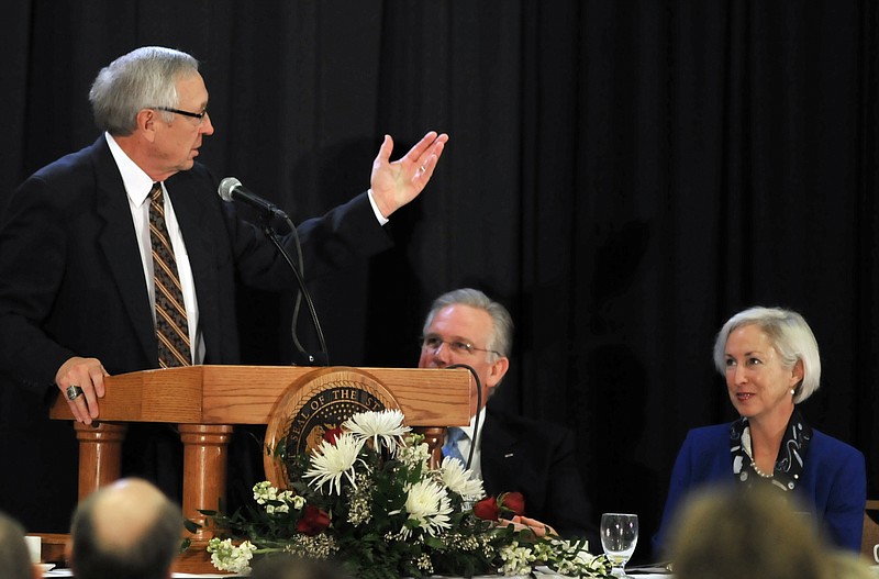 Retiring head football coach Mel Tjeerdsma turns to Gov. and Mrs. Jay Nixon during his remarks as the keynote speaker at the annual Governor's Prayer Breakfast. He is in his 17th year as coach at Northwest Missouri State University, and led his team to the Division II national championship in 2009 and to the semi-finals in 2010. He also serves as a deacon at First Baptist Church in Maryville.