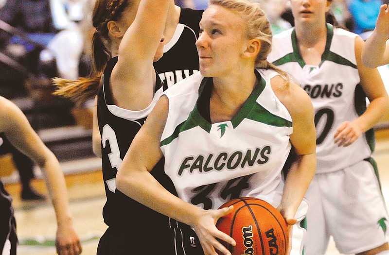 Blair Oaks' Maggie Dorge makes a move to the basket during Thursday's game with Centralia in Wardsville. To view this and other photographs, please visit www.newstribune.com/photos.