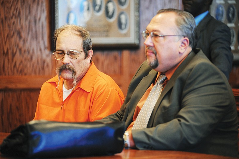 David Hosier, at left, along with his attorney, Donald Catlett of Columbia, made an appearance in Judge Pat Joyce's Cole County courtroom Thursday. Attornies on both sides are trying to settle on a county from which to import a jury so the trial can be held in Cole County. He is accused of killing Angela and Rodney Gilpin in September of 2009.