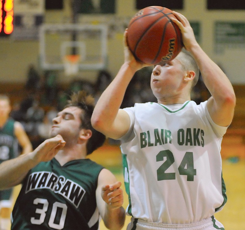 Blair Oaks Falcon Austin Kempker against the Warsaw Wildcats Friday at Blair Oaks High School. To view this and other photographs, please visit www.newstribune.com/photos.