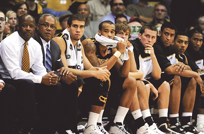 The Missouri bench watches the final seconds of Saturday's 89-76 loss to Colorado in Boulder, Colo. 