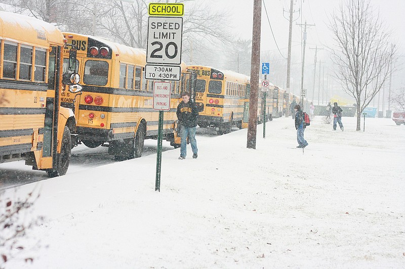 Stephanie Backus/FULTON SUN photo: Fulton School buses lined up at Fulton Middle School for a 2:30 p.m. snow dismissal Monday. Fulton joined other Callaway County schools who dismissed early after predictions of snow ranged from three to six inches.