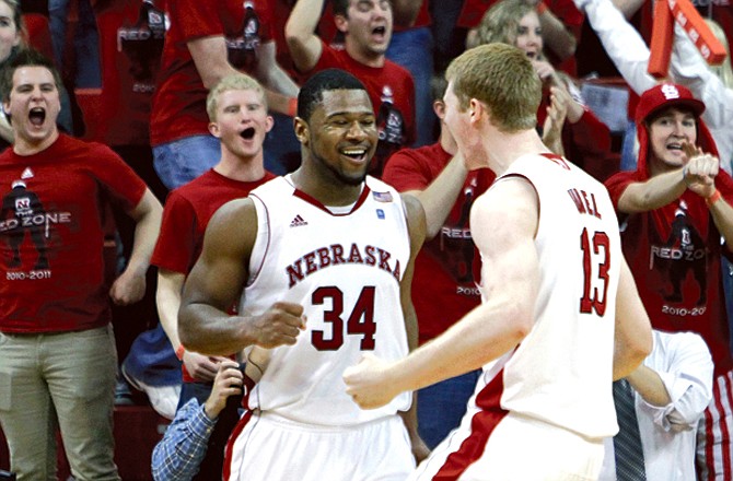 Lance Jeter (34) celebrates with Nebraska teammate Brandon Ubel after hitting a free throw with :00.4 left in Saturday's game against Iowa State in Lincoln, Neb. That proved to be the difference in Nebraska's 63-62 victory.