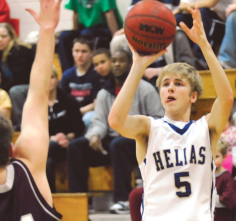 Josh Smith of Helias takes a shot during Friday's game against DeSmet in the Central Bank Shootout at Rackers Fieldhouse. 