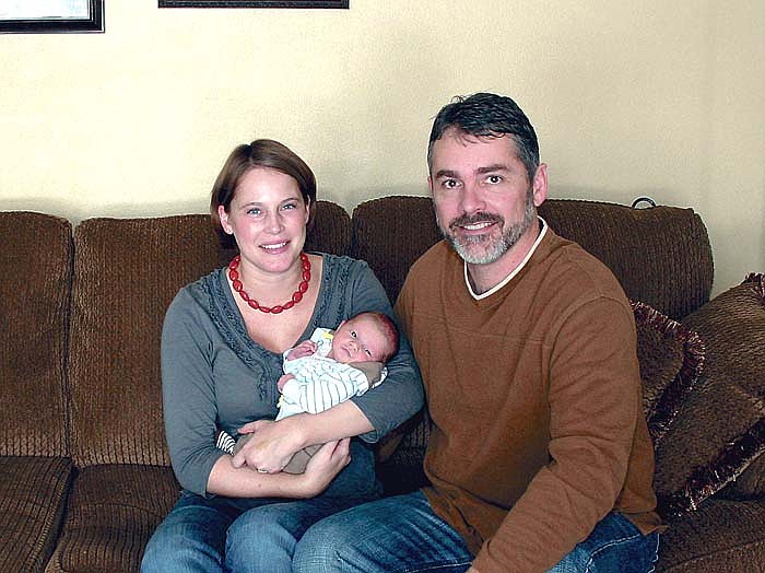 Manda and Scott Simon, Tipton, with their son Birkley, who was born Jan. 4 and ultimately declared the winner of the  2011 Moniteau County First Baby Contest.