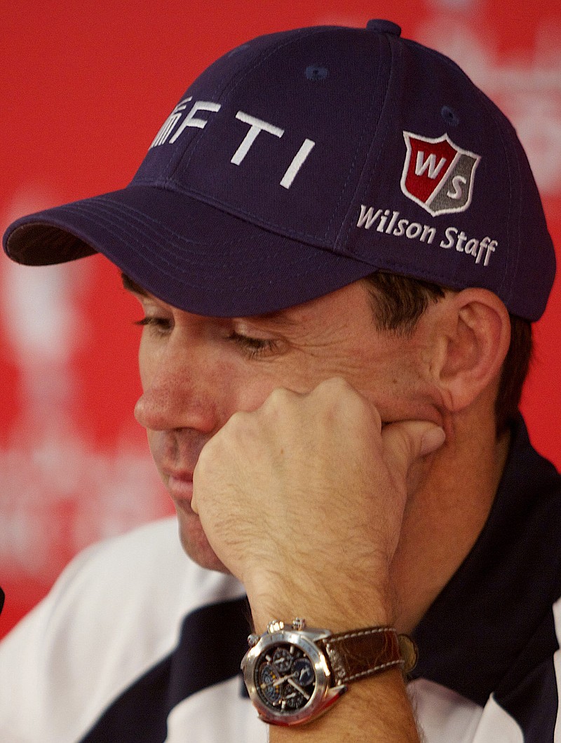 Ireland's Padraig Harrington attends a press conference after he was disqualified from the tournament during the second round of the Abu Dhabi Golf Championships in Abu Dhabi, United Arab Emirates, Friday, Jan. 21, 2011.