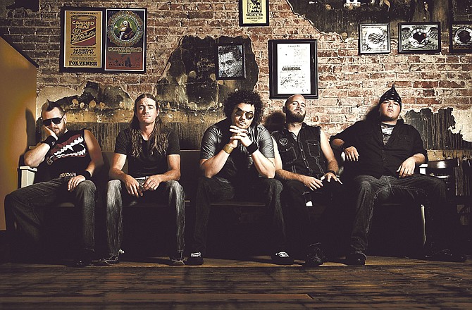 Local rockers Shaman's Harvest stayed on the charts throughout much of 2010, while turning down record deals and staying independent. From left, the band is drummer Craig Wingate; rhythm guitarist Josh Hamler; singer Nathan "Drake" Hunt; bassist Matt Fisher and lead guitarist Ryan Tomlinson. 