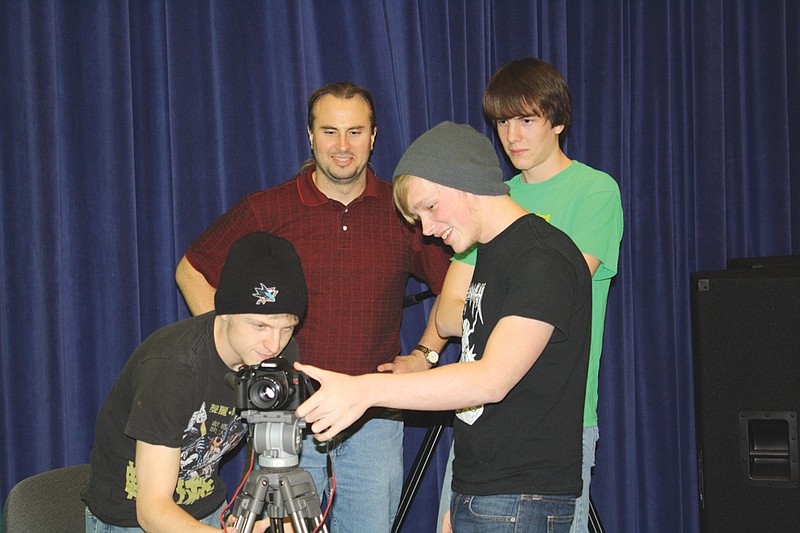 Mandi Steele/FULTON SUN photo: (Left) Chris Norton, Jason Knowles, Lincoln Purvis and Aaron Griffin filmed their short film "Young and Reckless" with a Canon camera. The four-man crew will show the movie they filmed at 8 p.m. Friday in Cutlip Auditorium on the campus of William Woods University.