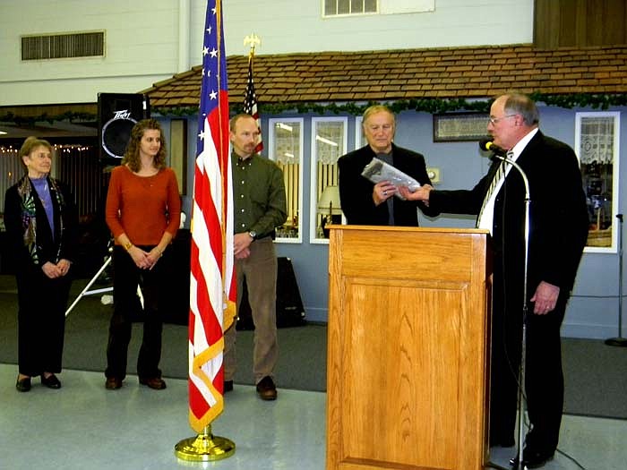 Family members present as Morris Burger presents Owner Earl Friedmeyer, California Construction Supply with the 2011 Business of the Year Award; from left, are Doris Nothnagel, Charla Friedmeyer, Co-Manager Brad Friedmeyer, Earl Friedmeyer and Burger. Co-Managers Debbie and Jay VanDieren were not present.