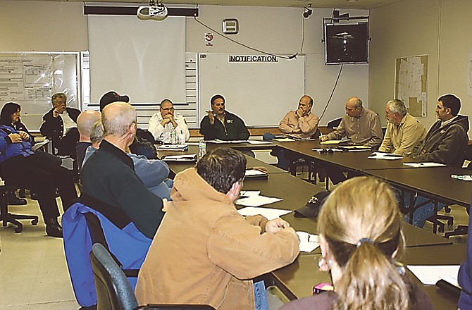 Members of the Callaway County Commission and representatives of different emergency officials review procedures in the wake of last week's snowstorm.