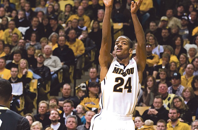 Kim English fires up a 3-pointer during Missouri's 89-73 win Saturday night over Colorado at Mizzou Arena. English finished with 21 points off the bench. 