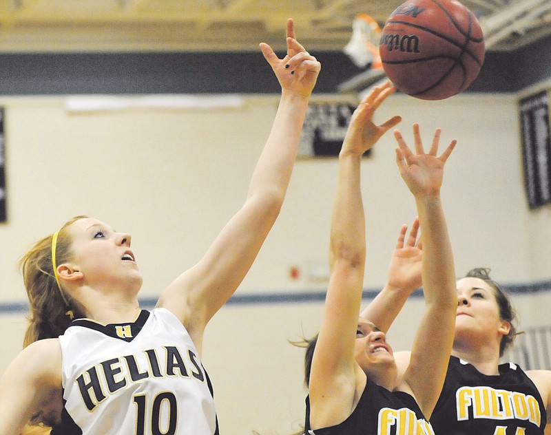 Steven Brooks/Special to the Fulton Sun: Fulton senior forward Meghan Davis goes up for a rebound in Monday night's 50-29 loss at Helias. 