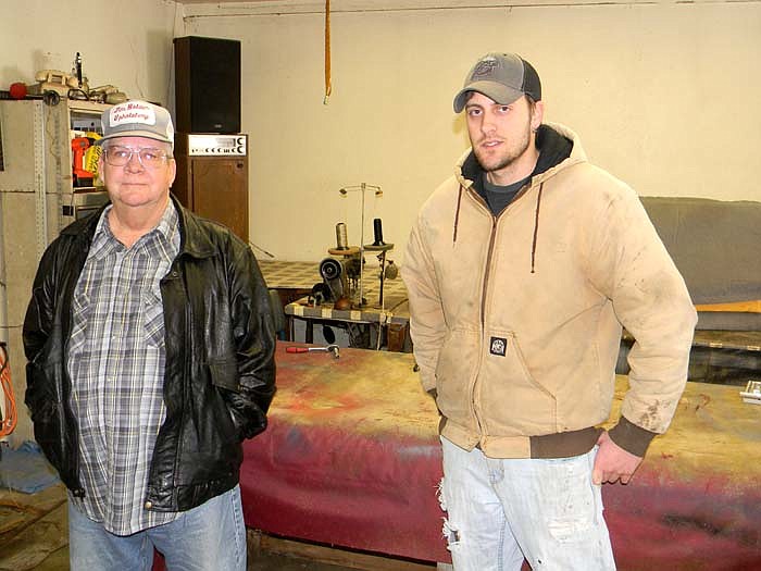 Custom Auto Upholstery Owner Jim Holder, left, with Bryan Lute, right, who will take over at the end of February.