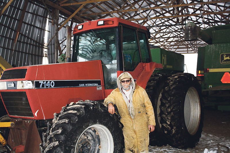 Mandi Steele/FULTON SUN photo: Hadley Linnenbringer uses his tractor for tilling during corn and bean planting seasons. This time of year he uses it for plowing snow. Linnenbringer's farm is located west of Hatton.